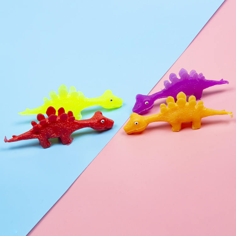 Wholesale custom soft TPR Stegosaurus catapult finger flinging funny toys for children