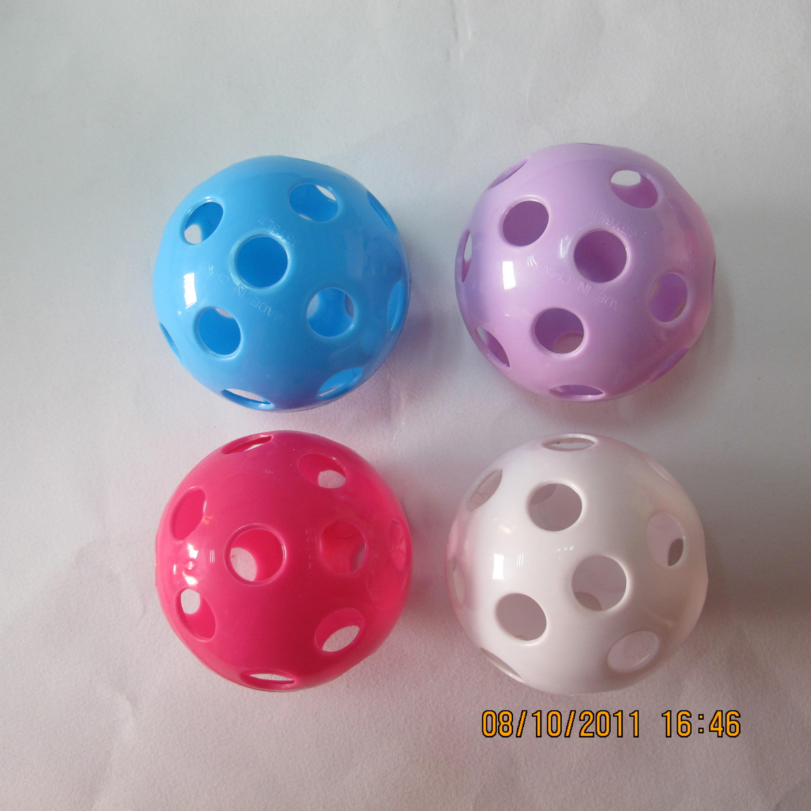 Wholesale high quality plastic 3 inch flashing multiple holes ball